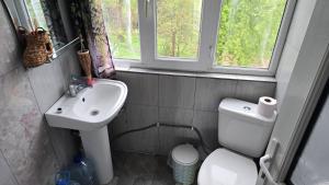 Koupelna v ubytování Olga's Home