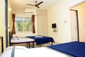 Shree Swami Samarth Resort客房内的一张或多张床位