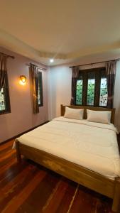 เตียงในห้องที่ Coastal Lodge Bang saray +31 ภาพ