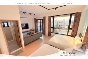 TV o dispositivi per l'intrattenimento presso 西衛參零陸民宿 Xiwei 306 Inn