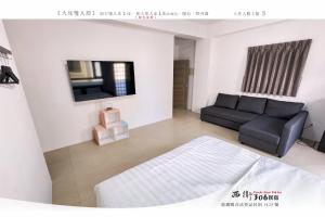 Letto o letti in una camera di 西衛參零陸民宿 Xiwei 306 Inn