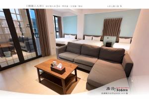 Area soggiorno di 西衛參零陸民宿 Xiwei 306 Inn