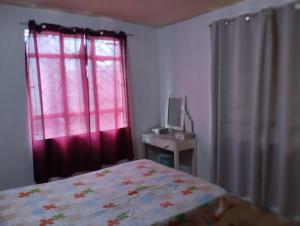 Kama o mga kama sa kuwarto sa Apartment Les Tulipes
