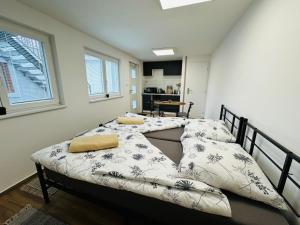 Postel nebo postele na pokoji v ubytování Útulný apartmán v klidné části Benešova