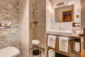 Ein Badezimmer in der Unterkunft Seehotel Hartung & Ferienappartements