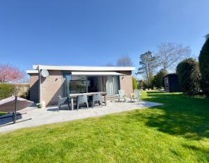 En have udenfor freistehendes Ferienhaus an der Nordsee, Eureka 18 - Strandbude