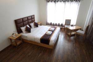 Postel nebo postele na pokoji v ubytování Paradise Shey 水森シェ