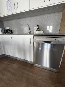 Kuchyňa alebo kuchynka v ubytovaní Apartamento luaS