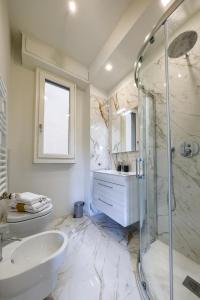 a bathroom with a sink toilet and a shower at BellaVita Boutique Florence in Florence