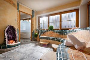 Predel za sedenje v nastanitvi Hotel Garni Forelle