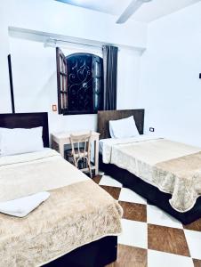 Postel nebo postele na pokoji v ubytování Golden Rose Guesthouse + 24 fotografií