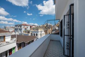 a balcony with a view of a city at Taxim Trend Suites in Istanbul