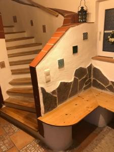 a house made out of a building with stairs at VillaVoigt, een Gezellig Familiehuis in Äussere Kainisch