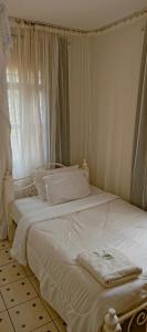 Postel nebo postele na pokoji v ubytování MELVIC INN