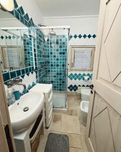 Phòng tắm tại Casa Nina La Maddalena