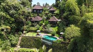 an aerial view of a resort with a swimming pool at Villa Wedang in Tegalalang