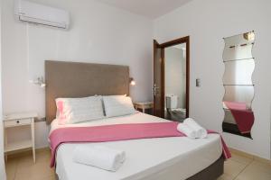 Posteľ alebo postele v izbe v ubytovaní Cathrin Beachfront Villa