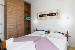 Posteľ alebo postele v izbe v ubytovaní Cathrin Beachfront Villa