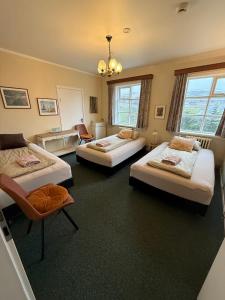 Voodi või voodid majutusasutuse Arsalir Guesthouse Vik B&B toas