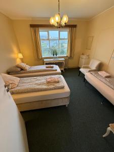 Voodi või voodid majutusasutuse Arsalir Guesthouse Vik B&B toas