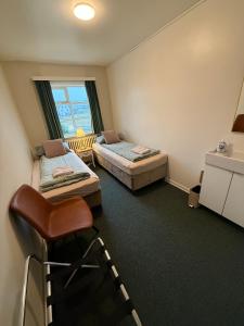 Voodi või voodid majutusasutuse Arsalir Guesthouse Vik B&B toas