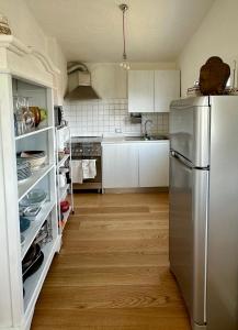 A kitchen or kitchenette at Boutique Art Villa Maria