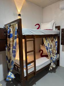 Postel nebo postele na pokoji v ubytování Moonlight surf hostel