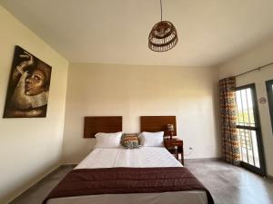 Ecolodge La Grande Tortue - Maison d'hôtes客房内的一张或多张床位