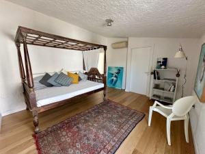 A bed or beds in a room at Boutique Art Villa Maria