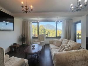 Posezení v ubytování Crai Stone House