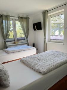 Postel nebo postele na pokoji v ubytování Ferienhaus Cassel