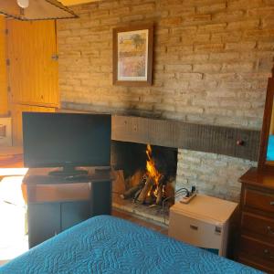 TV a/nebo společenská místnost v ubytování Apartamento con jacuzzi + 90 fotografií