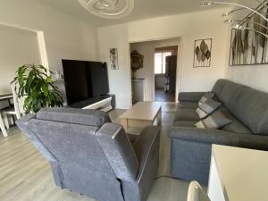 Χώρος καθιστικού στο Grand appartement spacieux
