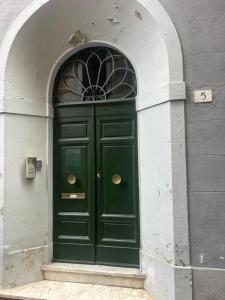 The facade or entrance of Pergola Suite