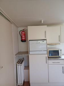Cucina o angolo cottura di Bungalow net buiten Zuidwolde
