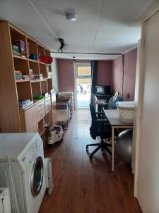 TV o dispositivi per l'intrattenimento presso Bungalow net buiten Zuidwolde
