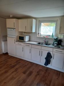 Cucina o angolo cottura di Bungalow net buiten Zuidwolde