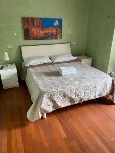 Ένα ή περισσότερα κρεβάτια σε δωμάτιο στο Residenza Fiera Verona in