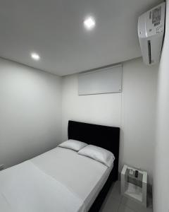 Postel nebo postele na pokoji v ubytování Espectacular Apartamento Amoblado - 2 Habitaciones