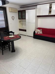 Area soggiorno di STELLA MARINA Apartment
