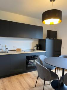Kuchyňa alebo kuchynka v ubytovaní Residence Dromaè