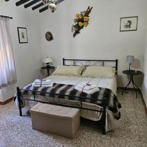 Postel nebo postele na pokoji v ubytování Casa di Campagna Il Granaio + 6 fotografií