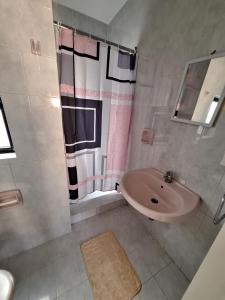 Koupelna v ubytování Lovely Paceville Studio I + 14 fotografií