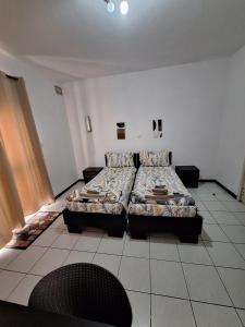 Postel nebo postele na pokoji v ubytování Lovely Paceville Studio I