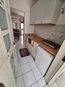 Kuchyň nebo kuchyňský kout v ubytování Lovely Paceville Studio I