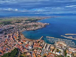 an aerial view of a city next to a body of water at Rallye Hotel in L'Escala