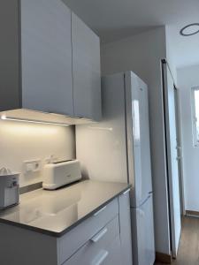 Kuchyň nebo kuchyňský kout v ubytování Villa BRISAETA