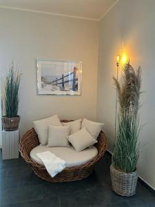 Posezení v ubytování Meerblickvilla Großenbrode Wohnung 21