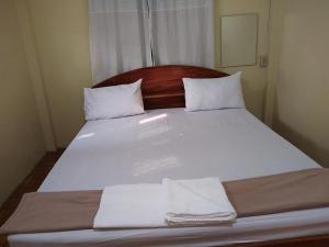 Fotografie z fotogalerie ubytování SUNTIPHAB guest House v destinaci Pakse