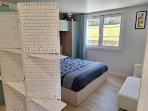 Postel nebo postele na pokoji v ubytování Alpine ski apartment - Petit Châtel